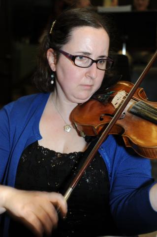 ESO Concertmaster Julie Fischer in rehearsal with the orchestra